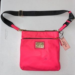 Juicy Couture hot pink cross body bag.